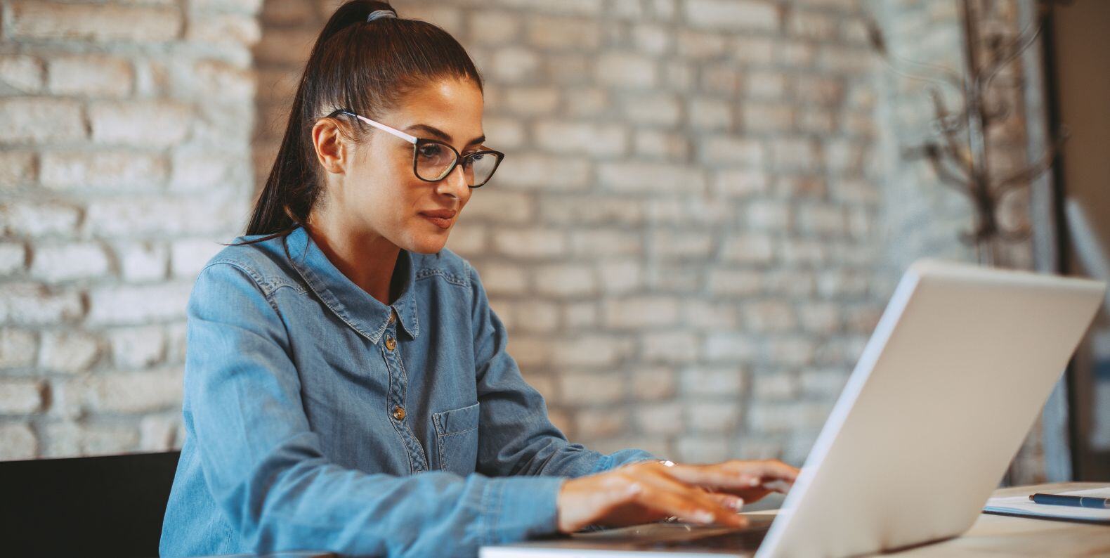 woman looking at saas product page design